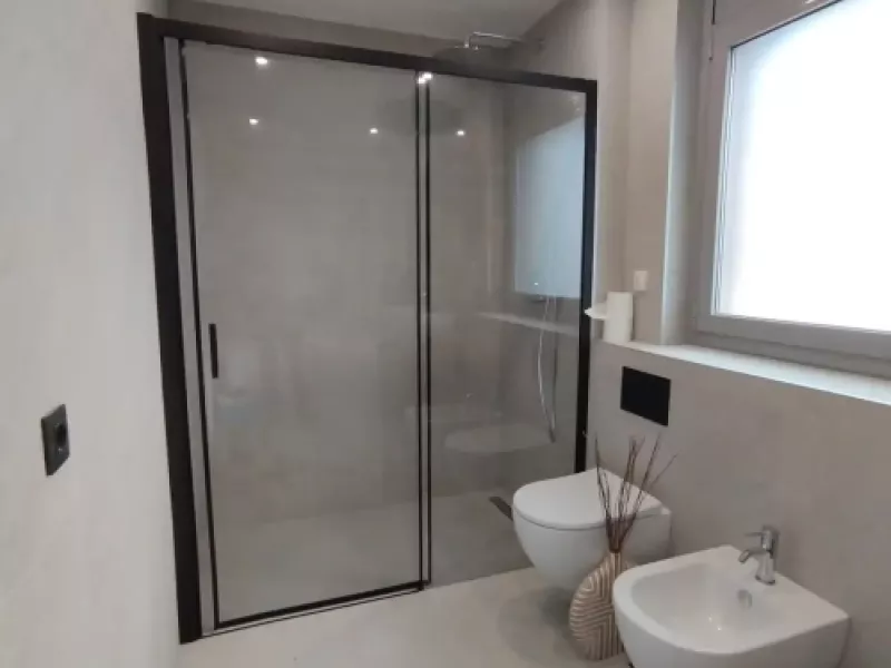 Baño reformado con azulejos modernos Maresme